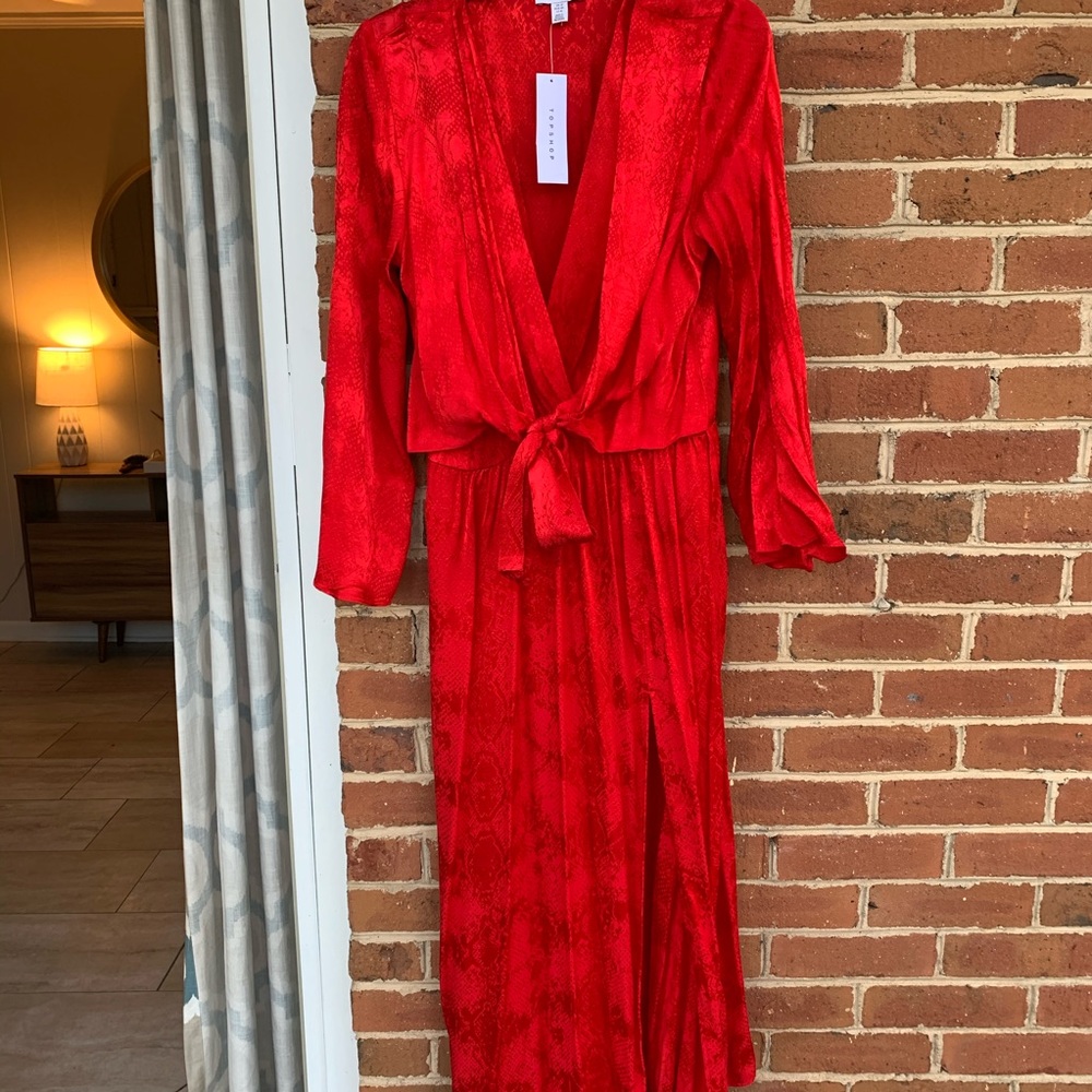 Red silk kimono-style wrap dress with side slit